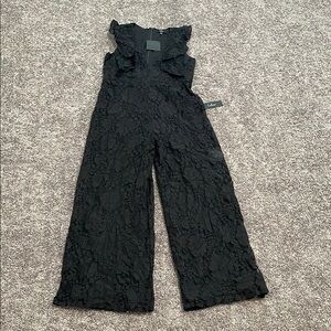 Lulu's Black Textured Jumpsuit with Wide-Leg Design